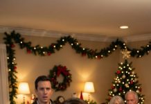 My phone buzzed as I parked outside my parents’ house, Christmas lights blurring in the rain. Dad: “Don’t come to Christmas Eve. It’ll be humiliating—your brother’s fiancée is a doctor.” I stared at the message, heart thudding. A doctor? My stomach dropped—I’d just seen her name on the applicant list at my hospital. Not just any name. Her name. The same woman who once swore she’d “bury” me if I ever spoke up. Then the door opened… and she smiled like we’d never met.