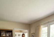 I was checking the living room camera from my hotel room, expecting nothing more than an ordinary afternoon. Instead, I watched my mother strike my wife with a slipper and scream, “If you won’t hand over every dollar you earn, then don’t act like this is your house!” Then my daughter ran in crying, wrapped herself around her mother—and my mother shouted, “Move, or I’ll hit you too!” That was the moment I realized I wasn’t seeing a family argument. I was watching fear rule my home.