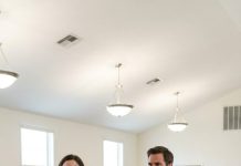 “She clutched my husband’s portrait to her chest and screamed, ‘You deserve nothing—not this house, not his money, not even his name!’ I stood there shaking, too stunned to speak, until Daniel’s best friend stepped forward and said, ‘Then tell them who paid your bills for five years. Tell them who kept food on your table when your son couldn’t.’ The room went silent. That was the moment I realized the truth was finally about to bury them.”