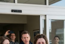 I was standing at the hospital entrance, still weak, when my mother-in-law stepped in front of everyone and hissed, “This is what you get for embarrassing my son.” She raised her hand like she wanted to “teach me a lesson,” and I froze—until a stranger behind me said, “Keep your hands to yourself… I’m recording.” Her face went white. By that night, the clip was everywhere, and even her own relatives were calling. But the real fallout? It hadn’t even started yet.