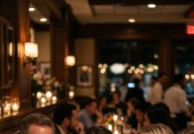 I sat at my brother’s engagement dinner with my hands folded in my lap, listening as my aunt smiled and said, “So… what are you doing these days?” Before I could answer, my mom cut in, “Oh, nothing big—she’s still figuring her life out.” The table chuckled. I swallowed it—until my brother’s fiancée turned to me, eyes narrowing. “Wait… you’re the one?” she murmured. Then she stood up and said, “Tell them what you really do.” And the room went silent.