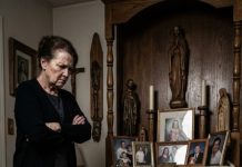 “I thought the worst was finally behind us—until the prayer room camera showed my mother forcing my wife to kneel for hours in front of the family altar. ‘Maybe pain will teach you respect,’ she said when my wife begged to stand because she was dizzy. Then my mother kicked the chair leg, and I watched my wife crash onto the floor. If I hadn’t seen that footage myself, I never would have believed what happened next.”