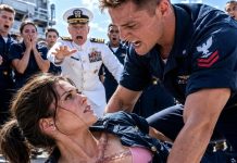 The laughter echoed across the Navy training yard as one sailor sneered, “Weak women belong at home, taking care of husbands and children.” Before I could answer, he slammed me onto the ground. My uniform tore across the chest, exposing the jagged scar beneath my undershirt. The laughter died instantly. The admiral rushed forward, his face turning white. “Oh, God,” he whispered. “Do you idiots have any idea who she is?”