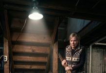 Ever since my father-in-law died, his old German shepherd barked like mad every time my mother-in-law entered the room. One night, as the dog clawed at the locked basement door, I heard her scream, “Get that animal away from there!” My hands shook as I opened the door—and found my father-in-law’s missing suitcase hidden under the stairs. What I saw inside changed everything.