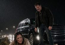 My husband thought the rain would wash away his confession, my blood, and the tire marks he left across my shattered ankles. He leaned over me on the highway shoulder and hissed, “Die in the mud, you useless cripple. The insurance money is worth more than you ever were.” I didn’t scream. I only looked at the blinking dashcam behind him—and smiled.