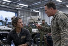 I kept my eyes on the busted fuel pump while Colonel Harrington barked over my shoulder, “Who’s your commander?” The whole motor pool went silent. Grease on my sleeves, frost in my hair, I let him think I was nobody for one more second. Then I smiled, unclipped the faded badge, and said, “You’re looking at him, sir.” His face drained of color—because my real orders had just arrived.