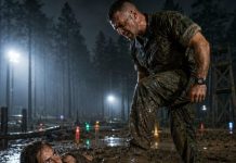 Mud filled my mouth after the Lead Instructor tackled me from behind. His boot pressed into my ribs as he sneered, “Paper-pushing women don’t belong in my course.” I didn’t answer. I only touched the recorder beneath my torn collar. At sunrise, he marched into the command tent grinning—until he saw me seated in full uniform, his career file open in front of me.