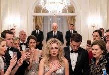 My mother-in-law ripped my dress open in front of hundreds of elite guests and sneered, “Tell everyone you’re nothing but a gold digger!” My husband lowered his head and stayed silent. They thought they had destroyed me forever. None of them noticed the billionaire standing at the ballroom entrance, watching everything. They had no idea they had just declared war on the wrong woman.