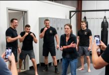 The moment I heard my right arm snap, the whole room went silent. One of them laughed, “Now what are you gonna do, hero?” I looked down at my useless arm, then back at the three men blocking the door. “You made one mistake,” I whispered. “You thought Navy SEALs needed both hands.” Ten seconds later, they understood why I hadn’t screamed… and why I was still standing.