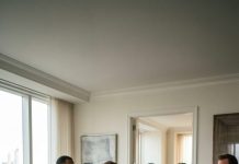 After my grandparents died in a car crash, their attorney looked at me and said, “You’re the only heir to their $31 million estate.” My family demanded I sign everything over that same day. When I refused, they threw me out before midnight. So I moved into my grandparents’ penthouse. The next morning, they stormed in to force me out—but froze when they saw who was waiting inside.