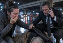 We froze when we found Mom sleeping on newspapers beneath a highway overpass. “What happened to your $450,000 house?” I asked, fighting tears. She lowered her eyes and whispered, “Your brother and his wife sold it while I was in the hospital.” My husband’s face turned cold. He made one phone call to his federal investigator—and by sunrise, their accounts were frozen, the sale was reversed, and police were pounding on their door.