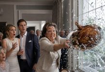 I spent six hours preparing a lavish dinner for my daughter-in-law’s wealthy parents. Before they arrived, she tasted the gravy and deliberately spat it right in my face. “It’s disgusting, just like you,” she hissed. My son just patted her shoulder to calm her down, ignoring me completely. I quietly wiped my face, picked up the entire roasted turkey platter, and threw it straight through the dining room’s glass window. The shattering crash made them both freeze in terror just as the doorbell rang…