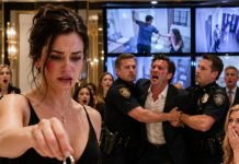 My husband struck me across the face before our entire family, then raised his glass and laughed. “No one here would dare challenge me.” I silently removed my wedding ring and dropped it into his wine. The restaurant screens suddenly played hidden footage of every beating. Police officers, lawyers, and his business partners entered together. His confidence vanished—but when I lifted the final document from my purse, he began begging before I even revealed what it contained…