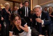 At my husband’s welcome party for his colleagues, he dressed me like a servant and ordered me to carry trays. When the roast burned, he slapped me before everyone. “You’re useless,” he hissed. The blow sent my silver necklace skidding across the floor. His billionaire boss picked it up—and suddenly went pale. “Where did you get this?” he whispered. Then he stared into my eyes and said, “My daughter vanished twenty years ago…” My husband laughed, unaware that his destruction had just begun.