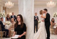 Everyone applauded when my sister kissed the fiancé she had stolen from me. No one looked toward the column where they had hidden my table—until a powerful stranger offered me his hand. “Follow my lead,” he murmured. When he announced that her multimillion-dollar hotel sale was built on forged documents, the ballroom fell silent. My sister screamed, “This is my wedding!” I took the microphone and replied, “No, Vanessa. This is evidence.”