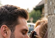 “You’re kissing… my stepmother?” My voice shattered the silence just minutes before our wedding. My fiancé jerked away, but my stepmother only smirked, wiping lipstick from his lips. “It’s not what you think,” he stammered. I laughed through my tears. “Then tell me why she’s wearing the necklace you promised me.” As the wedding guests began gathering outside, I realized the biggest betrayal wasn’t the kiss—it was the secret they had been hiding from me for years.