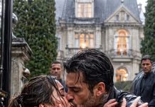 I was being humiliated outside his mansion when someone sneered, “A woman like you will never belong here!” Tears blurred my vision—until a black luxury car screeched to a halt. He stormed toward me, wrapped me in his arms, and kissed me without hesitation. Then his icy voice shattered the silence. “Who touched my wife?” Every face turned pale… but none of them knew the punishment he had prepared.