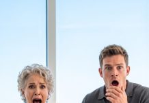 I was reaching for my grandmother’s hand when the glass balcony door slammed shut behind us. “Don’t move,” she whispered, her face drained of color. Across the penthouse, the man we had buried three years ago stepped out of the elevator, alive—and holding my father’s will. My throat went dry as he smiled and said, “Surprised to see the truth come home?”