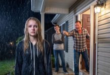 At fifteen, I stood in the pouring rain while Dad screamed, “You’re not my daughter tonight.” My brother’s lie had destroyed me, and I walked away without begging. Two weeks later, I heard Dad laughing about it to his friends. I stepped from the hallway and said, “Tell them the rest.” Then he turned pale—because Mom was right behind him, holding the proof.