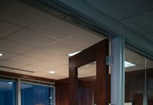I stood outside my husband’s CEO office, ready to surprise him, until I heard him laughing with his secretary. “My wife still doesn’t know I filed for divorce,” he said. Then I saw him kiss her against his desk. I didn’t cry. I didn’t storm in. I just walked away, called my lawyer, and quietly took back my 59% shares. By morning, he finally learned who owned his empire.