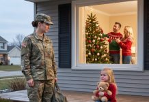 I came home early from my military base to surprise my family for Christmas, but my six-year-old daughter was sitting on the porch, hugging her teddy bear. “Daddy said we don’t belong here anymore,” she whispered. Through the window, I saw my husband kissing another woman beside our Christmas tree. I didn’t scream. I simply smiled, picked up my daughter, and walked away. They had no idea what I was about to do.