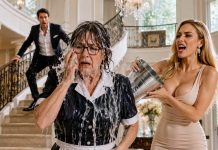 I disguised myself as a housekeeper to test my son’s fiancée before their wedding. The moment she saw my worn uniform, she sneered, “You look disgusting. Someone needs to wash the filth off you.” Then she threw a bucket of dirty water over my head and laughed. I calmly wiped my face, pressed the hidden recorder in my pocket, and called my son downstairs…