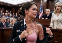 They called me a liar in front of a packed courtroom, and my own mother made sure everyone believed it. With one hand on the Bible, she looked the judge in the eye and said, “She was never a soldier. She faked the scars, the medals, all of it.” The room turned cold as every face shifted toward me with disgust. Then the courtroom doors opened, and the man stepping inside made my mother’s smile vanish.