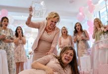 I was eight months pregnant, standing under pastel balloons, when my friends cheered, “For you—and the baby.” Someone whispered, “We raised $50,000 for your medical bills.” I was crying, laughing… until my mom’s eyes locked on the donation box. “Move,” she snapped, grabbing for it. “Mom, no—this isn’t yours!” Her smile vanished. She reached behind the table, yanked out a heavy iron rod from the decorations, and hissed, “You don’t deserve this.” Then—CRACK. The blow slammed into my belly. A hot, terrifying rush… my water broke instantly.