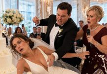 At our wedding reception, my husband suddenly raised his glass and announced, “I’m giving Mom all my premarital assets—and $6,000 every month!” The guests applauded while my mother-in-law cried dramatically and called him “the perfect son.” I simply smiled, took the microphone from his hand, and said, “Wonderful—then you won’t mind hearing what I did with my money this morning.” The room fell silent, and his mother’s smile disappeared when I revealed the first detail…