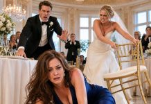 “You don’t belong at the family table,” my sister sneered before yanking my chair away. I crashed to the floor in front of 200 wedding guests as laughter rippled through the room. Then her groom shot to his feet. “That’s enough!” He stared at her, pale with fury. “Do you really want me to tell everyone the truth?” My sister froze—and when he reached for the microphone, I realized her perfect wedding was about to become something else entirely.