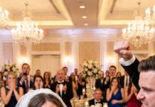 On the happiest day of my life, my husband struck me across the face before three hundred guests. “Smile,” he hissed, tightening his grip on my arm. “You belong to me now.” My veil slipped, revealing the dark bruise blooming beneath my eye. The room fell silent—but I didn’t cry. I reached into my bouquet, pulled out a tiny recorder, and whispered, “Good. Now everyone knows what you did.” Then the ballroom doors burst open.