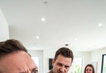 After years away on classified missions, I came home expecting to surprise my seven-month-pregnant sister. Instead, I found her on her knees, bruised, scrubbing the floor while her husband sneered, “You’re useless—even carrying my child.” She looked up, terror flooding her eyes. “Please… don’t make him angry.” I set down my bag and locked the door behind me. He laughed—until I pulled out the military file bearing his name. “Now,” I said, “tell her what you did.”