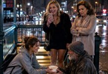 My family laughed when I spent my last twelve dollars feeding a ragged street beggar. “Kindness is why people like you stay poor,” my aunt sneered before throwing me out of her house. I said nothing—until three weeks later, that same “beggar” walked into my cousin’s luxury engagement party in a tailored suit. The room went dead silent when a businessman whispered, “Do you know who that man is?”