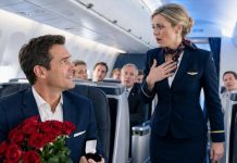 I boarded my wife’s flight carrying twelve roses and our tenth-anniversary ring, expecting tears of joy. Instead, the captain’s voice filled the cabin: “Please congratulate Vanessa—the future Mrs. Marcus Vale.” As strangers applauded, she leaned close and hissed, “Don’t make a scene.” I smiled, glanced at the fraudulent invoice glowing on his tablet, and whispered, “You’re right. Monday will change everything.” Neither of them understood what I had just discovered.