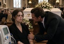 At my sister’s funeral, her husband leaned over my dialysis machine and whispered, “Smile for the cameras, you dying bitch, or this machine gets unplugged tonight.” I didn’t cry. I didn’t beg. I simply handed the priest my burner phone. Seconds later, the church screen showed Derek crouching beneath my sister’s car, tampering with her brakes. His face went white—but the video wasn’t the only evidence I had.