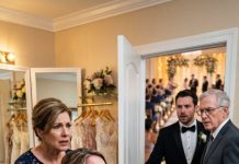 Minutes before my wedding, my mother locked me inside the dressing room and shoved an $800,000 property transfer across the table. “Sign it, or this wedding is over!” she screamed. When I refused, she grabbed my throat and slammed my head against the wall. I screamed for help—then the door suddenly opened. My mother turned pale when she saw who was standing there… because he knew the truth she had buried for years.