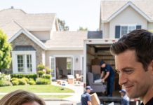 I came home from vacation expecting silence—but found strangers carrying boxes out of my driveway. My son stood on the porch, holding a glass of champagne like he owned the world. “Mom, I sold your house and your car. You have nothing left, so get out.” I stared at him, then slowly smiled. “You sold them?” I whispered. “Interesting… because neither one was legally yours.” Then a black sedan stopped behind him—and two men stepped out.