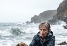 Eight months pregnant, bleeding across jagged rocks, I watched the tide race toward me. My mother-in-law yanked my hair and shoved my face into the surf. “Only one of us leaves this island alive—and it won’t be the breeding machine.” I clawed at the stones, protecting my baby, then heard a motor beyond the fog. She froze. Because the man stepping onto shore was supposed to be dead—and he was calling my name.