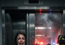 Please… don’t leave me!” I cried, one hand wrapped around my pregnant belly as the elevator doors began to close. My husband didn’t even look back. He grabbed another woman’s hand and pulled her to safety first. Seven agonizing hours later, he returned, screaming, “Where’s my wife?” His coworker stared at him in disbelief before answering, “You rescued your ex-wife… not the woman carrying your child.” Everything fell apart after those words.