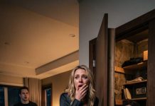 I was minutes away from boarding my flight when the house camera suddenly went offline. I rushed home—and found my husband blocking our locked bedroom door. “What are you hiding in there?” I demanded. He went pale. “You need to leave, now.” But I refused. Then I heard a faint noise coming from behind the door… and realized the secret inside could destroy everything we had.