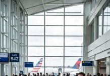My husband died five years ago… or so I believed.” At the airport, I saw a stranger with his face, his walk, even the scar above his eyebrow. I followed him in disbelief until I froze. Walking beside him was my mother-in-law, a young woman holding his hand, and a little boy calling him, “Daddy.” My heart stopped. If my husband was alive… whose funeral had I attended?