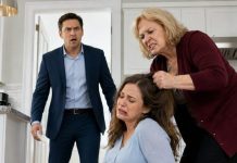 I came home three hours early and found my pregnant wife trembling on the kitchen floor, my mother’s fist tangled in her hair. “This is my son’s house—you are nobody here,” she hissed. I threw her suitcase outside without raising my voice. Then my wife’s phone lit up beside the table: 412 dated notes, and the final one said, “Check the blue mug.” What had my mother made her drink?