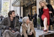 Everyone thought I was a penniless disabled street vendor—including the ex-fiancée who kicked over my cart and called me useless. Only Eleanor, a woman twenty years older than me, knelt to gather the chestnuts. Then my enemy grabbed her mother’s emerald brooch and hissed, “Give it back, old woman.” I rose from my wheelchair, straightened my billionaire’s suit, and said, “You’ve just threatened the wrong family.” But that was only the first surprise…