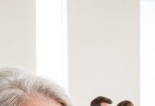 At my eldest son’s funeral, everyone was crying—except his wife and my younger son. I watched them exchange a strange smile beside his coffin. Then my daughter-in-law leaned toward my son and whispered, “She still doesn’t know.” My heart stopped. I stepped closer, but they immediately fell silent. My son had died three days ago… so what secret were they hiding from me?