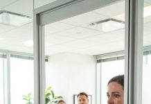 I brought my husband lunch at his office, expecting a sweet surprise. Instead, I opened his door and caught him kissing his young secretary against his desk. He froze. “Honey, it’s not what you think.” I stared at them, calmly placed the lunch on the table, and whispered, “You’re right. It’s much worse.” Then I walked away, already knowing exactly what I was going to do next.