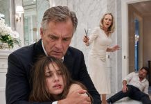 My daughter whispered, “Dad, help,” and the line went dead. I drove at 100 mph to her in-laws’ mansion. My son-in-law blocked the porch, gripping a baseball bat, sneering, “This is a private family matter. Your daughter needed discipline.” One punch dropped him. Inside, I found his mother pinning my daughter down as she screamed, sawing off her long hair. “This is the price of disobedience,” she hissed. I tore my daughter free just in time—her body burning with fever as she collapsed in my arms. They thought I’d leave quietly. They were wrong. It was time they learned who I really am.