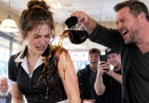 The hot coffee hit my shoulder, and the entire diner went silent. Brent laughed, grabbed my wrist, and sneered, “What are you going to do about it, waitress?” I looked down at his hand and felt ten years of buried training wake up inside me. “Let go,” I whispered. He laughed again. Three seconds later, he was flying backward into a booth—and that was only the beginning.